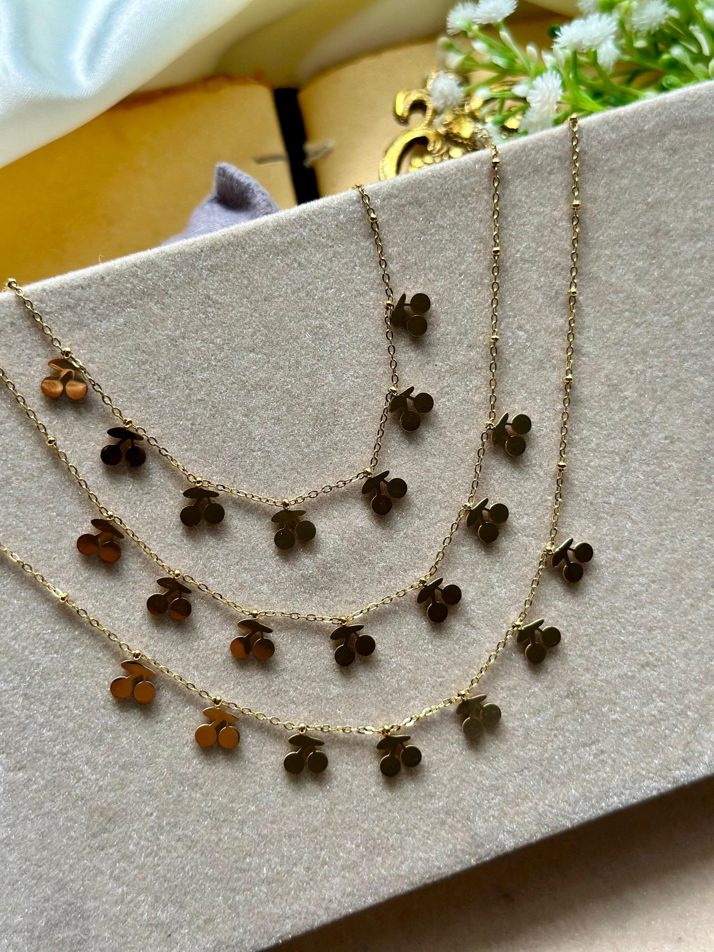 Golden cheri charm necklace with earrings