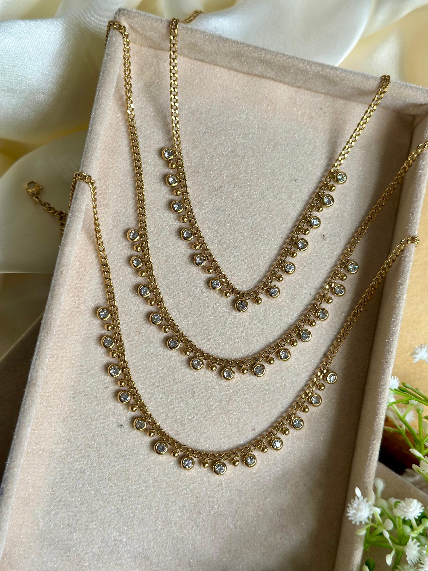 White stoned charm necklace
