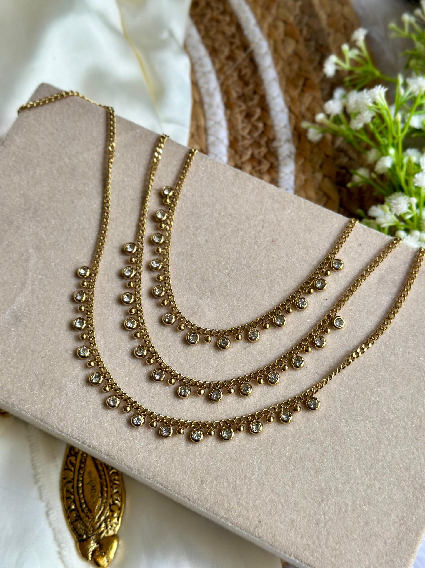 White stoned charm necklace